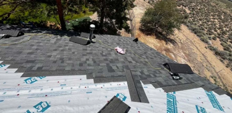 Asphalt shingle roof replacement in progress on a Reno Nevada home with underlayment visible
