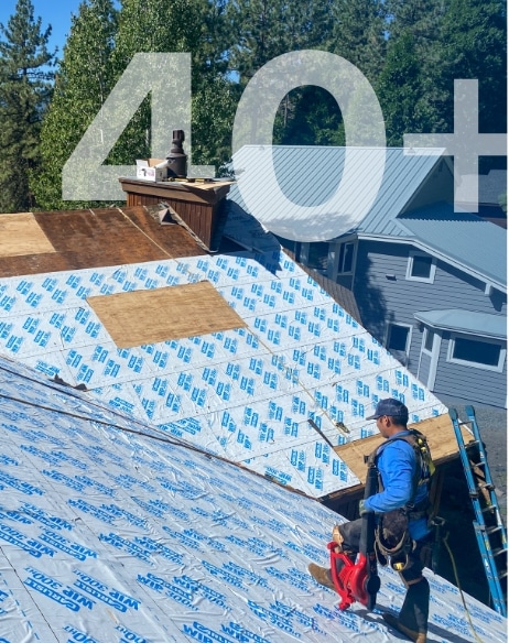 Mills Roofing employee installs roof in Truckee
